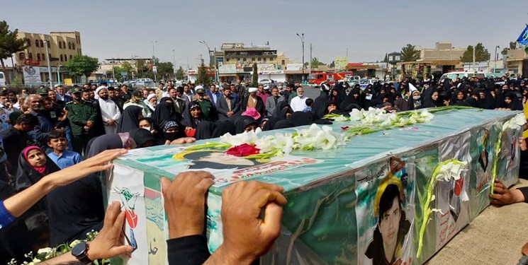 شهید مدافع حرم در جوار همرزمانش آرام گرفت/بازگشت پیکر شهید بعد از ۸ سال به رفسنجان